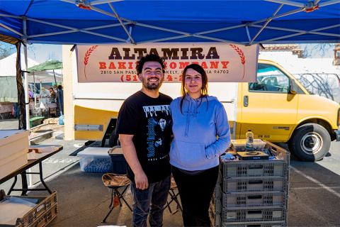 Altamira baking sellers in their booth at the Pinole Farmers' Market