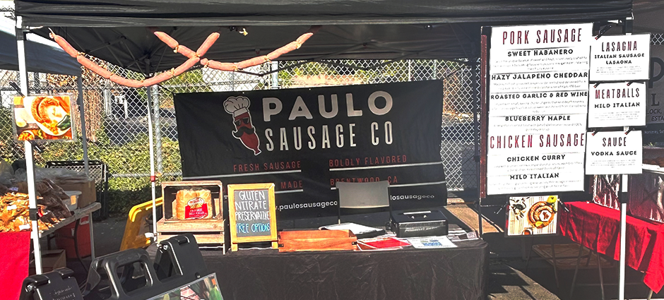 Paolo Sausage stall filled with a menu showcasing the varieties of sausage 