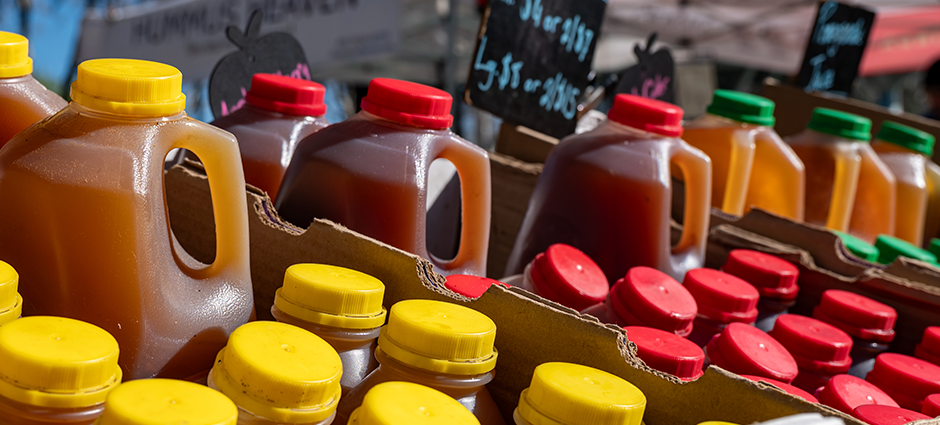 Smit Farms display of ciders at their stall in the market